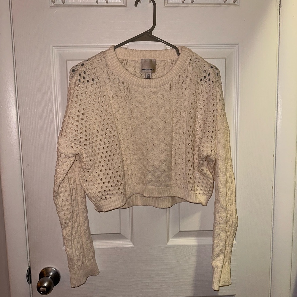 Cream knit cropped sweater. Size medium.